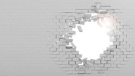 Background of a brick wall broken throughの写真素材