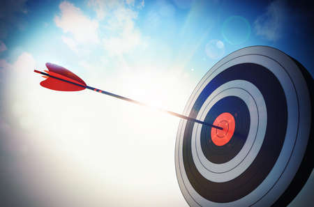 Target hit in the middle by arrow Target hit in the middle by arrow