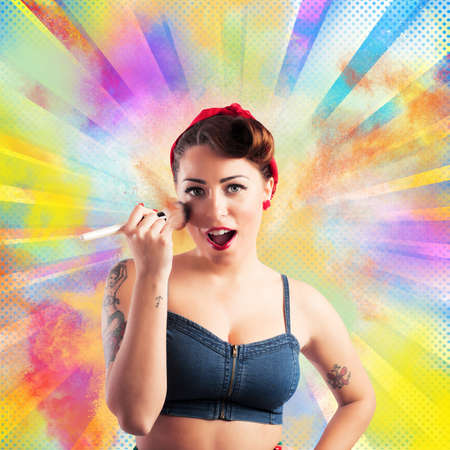Pin-up woman make-up with colored powders backgroundの写真素材