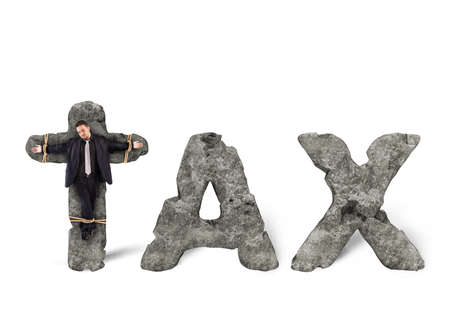 Man tied to a stone with ropeの写真素材