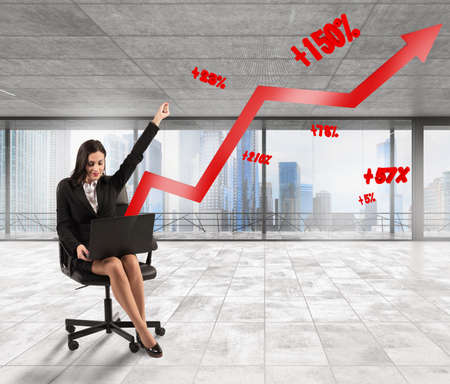 Woman exults with an arrow with percentagesの写真素材