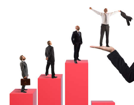 Businessmen on the steps of a statistic