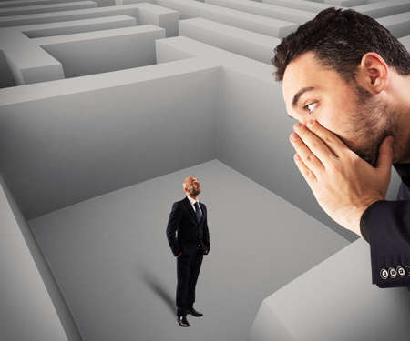 Man inside the maze hears a suggestionの写真素材