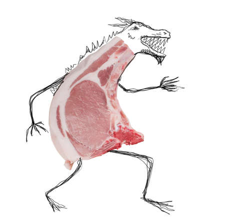 Slice of raw beef with drawn a bad monsterの写真素材