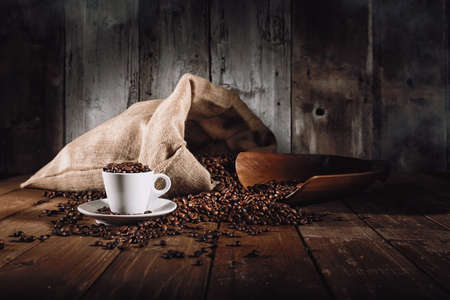 Background of cup of coffee beansの写真素材