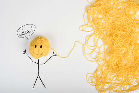 Concept of idea and innovation with tangle of wool yarnの写真素材
