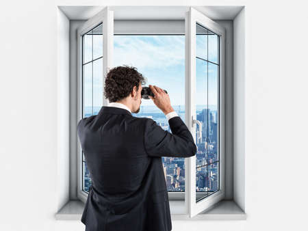 Businessman looking to the future and new businessの写真素材