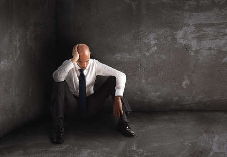 Alone desperate businessman. solitude and failure concept