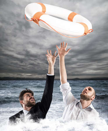 Help businessmen fallsの写真素材