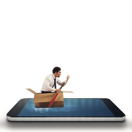 Businessman surfing into a cellphoneの写真素材