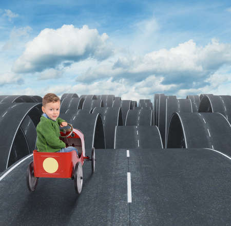 Difficult future of a kid with disjointed streetsの写真素材