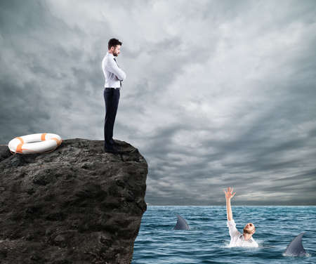 Businessman who doesnt help a competitorの写真素材