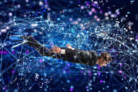 Businessman surfing the internet underwater with mask. Internet exploration conceptの写真素材