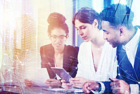 Businessperson in office with network effect. concept of partnership and teamworkの写真素材