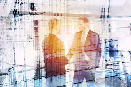 Businessperson that speak in office. double exposureの写真素材