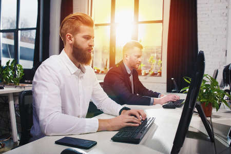 Businessperson in office connected on internet network. concept of partnership and teamworkの写真素材