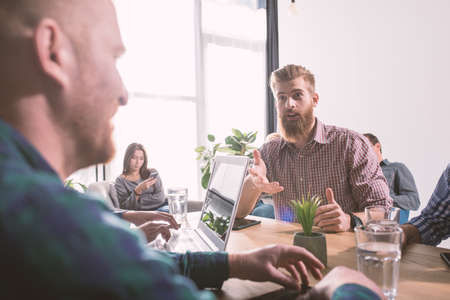 Businessperson in office connected on internet network. concept of partnership and teamworkの写真素材