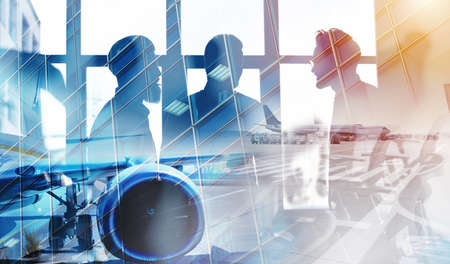 Take off of an aircraft with double exposure of airportの写真素材