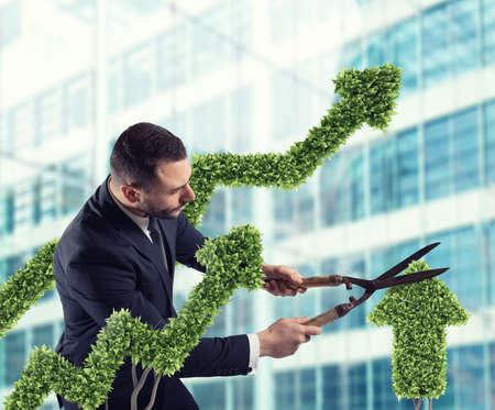 Businessman that cuts and adjusts a plant shaped like an arrow stats. Concept of startup company . 3D Renderingの写真素材