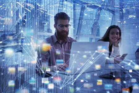 Businessman in office connected on internet network. concept of startup companyの写真素材