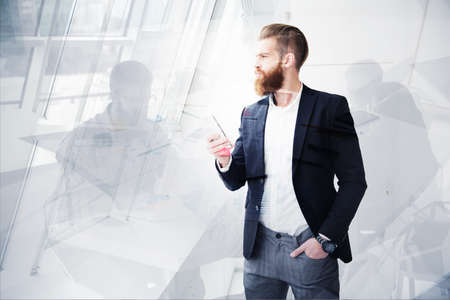 Businessman looks far for the future. Concept of innovation and startupの写真素材