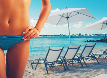 Girl ready to summer with sunglasses in bikiniの写真素材