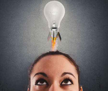 Fast lightbulb as a rocket ready to fly. Concept of new super ideaの写真素材