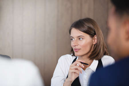 Confident businesswoman during a business meeting. Concept of success and teamwork