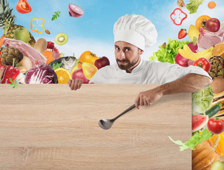 Chef with board and vegetables background