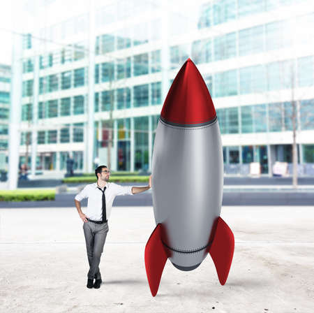 Startup of a new company with starting rocket. Concept of business growthの写真素材
