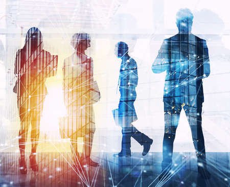 Business people work together in office with internet network effects. Concept of teamwork and...