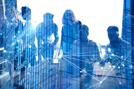 Business people work together in office with internet network effects. Concept of teamwork and...