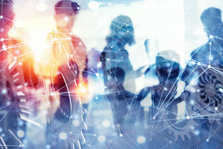 Business people work together in office with internet network effects and gears system. Concept of...