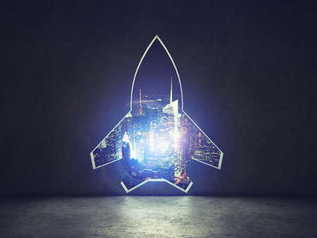 Concept of startup with a rocket shape hole in the wall which alludes to the departure towards new goalsの写真素材