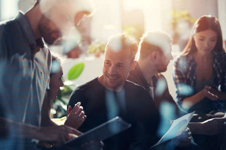 Business people connected on internet network with a tablet. concept of startup company. double...