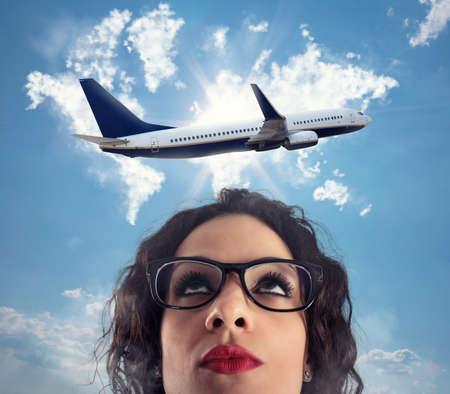 Woman wants to take a break from her work for a airplane trip