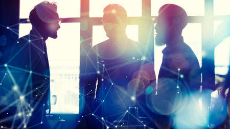 Business people collaborate together in office. Double exposure effectsの写真素材