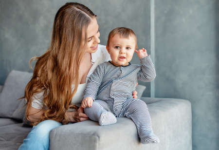 Little child smiling and happy with mom