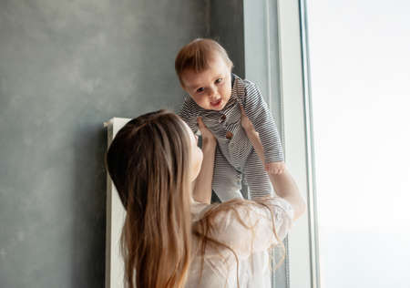 Little child smiling and happy with momの写真素材