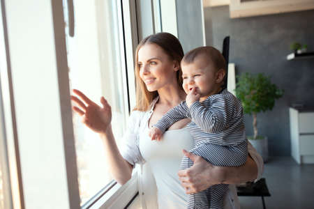 Little child smiling and happy with mom