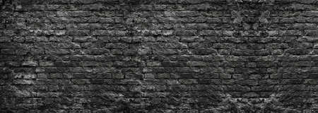 Grunge background of a wall of bricksの写真素材