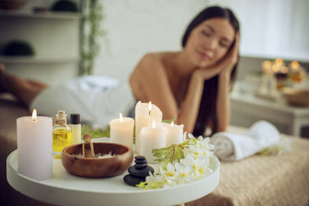 Woman relaxing with a massage in a spa centerの写真素材