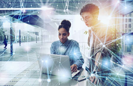 Business person in office connected on internet network. concept of startup company. Double exposure