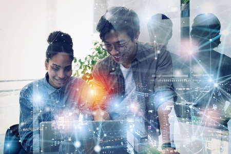 Business person in office connected on internet networkの写真素材