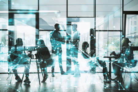 Network background concept with business people silhouette working in the office. Double exposure and network effectsの写真素材