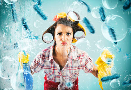 Funny housewife cleans and disinfects to keep germs awayの写真素材