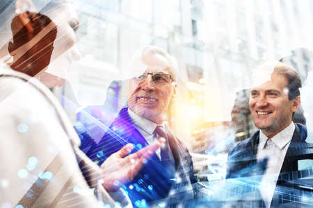 Business people that work together in office. Concept of teamwork and partnership. Double exposure