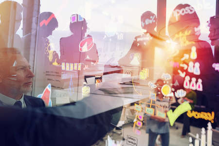 Business people work about a new startup project. Concept of teamwork, innovations and statistics....