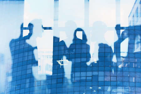 Business people collaborate together in a modern office. Internet connection effects. Double...