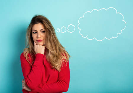 Confused woman have to choose something. Concept of options, confusion, decision. Cyan background